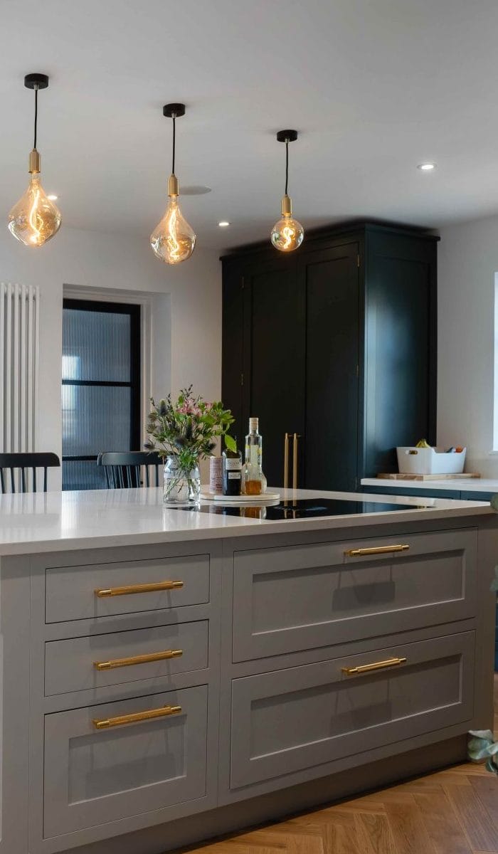 CUSTOM DARK SHAKER KITCHEN WITH OAK PARQUET FLOORING