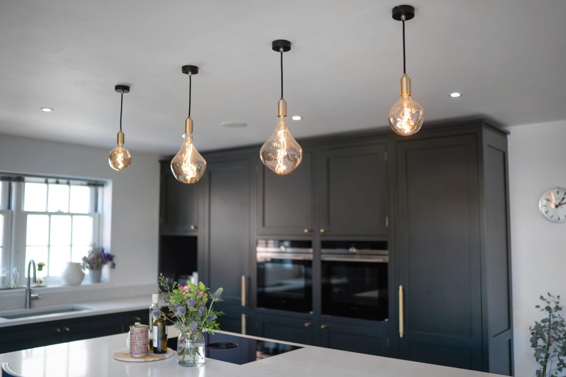 CUSTOM DARK SHAKER KITCHEN WITH OAK PARQUET FLOORING