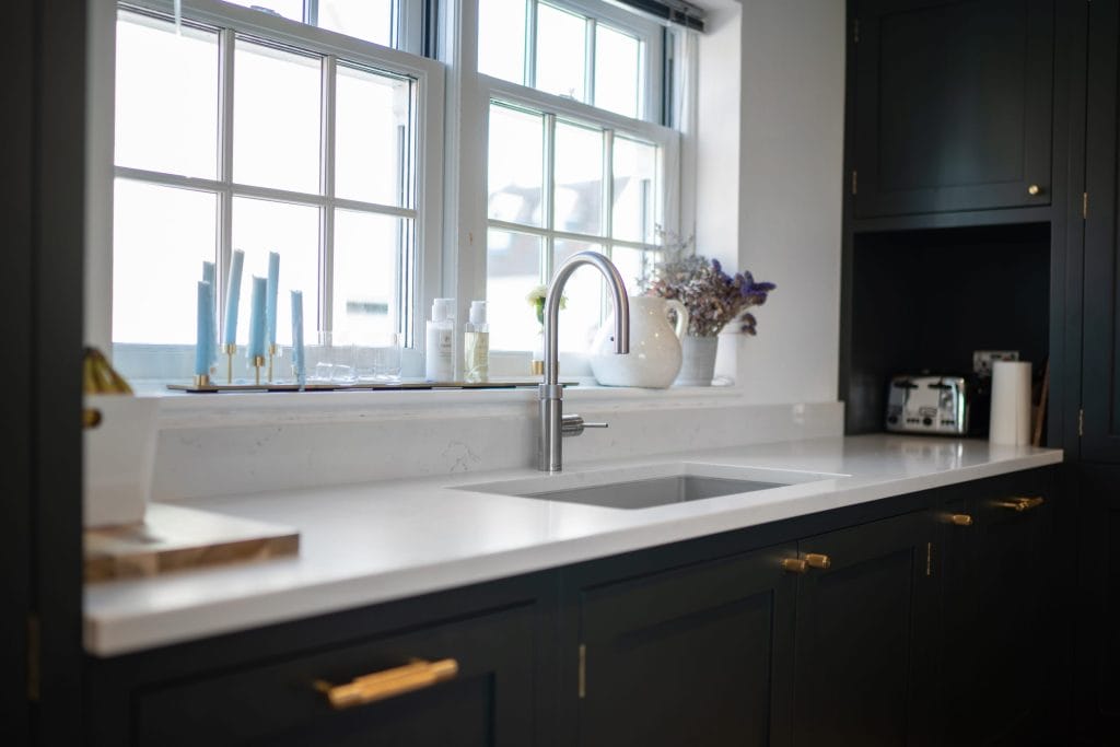 CUSTOM DARK SHAKER KITCHEN WITH OAK PARQUET FLOORING