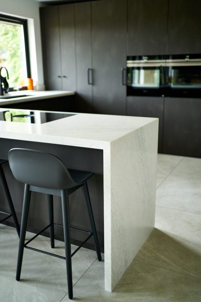 Sleek German Kitchen with Bold Concrete Finishes