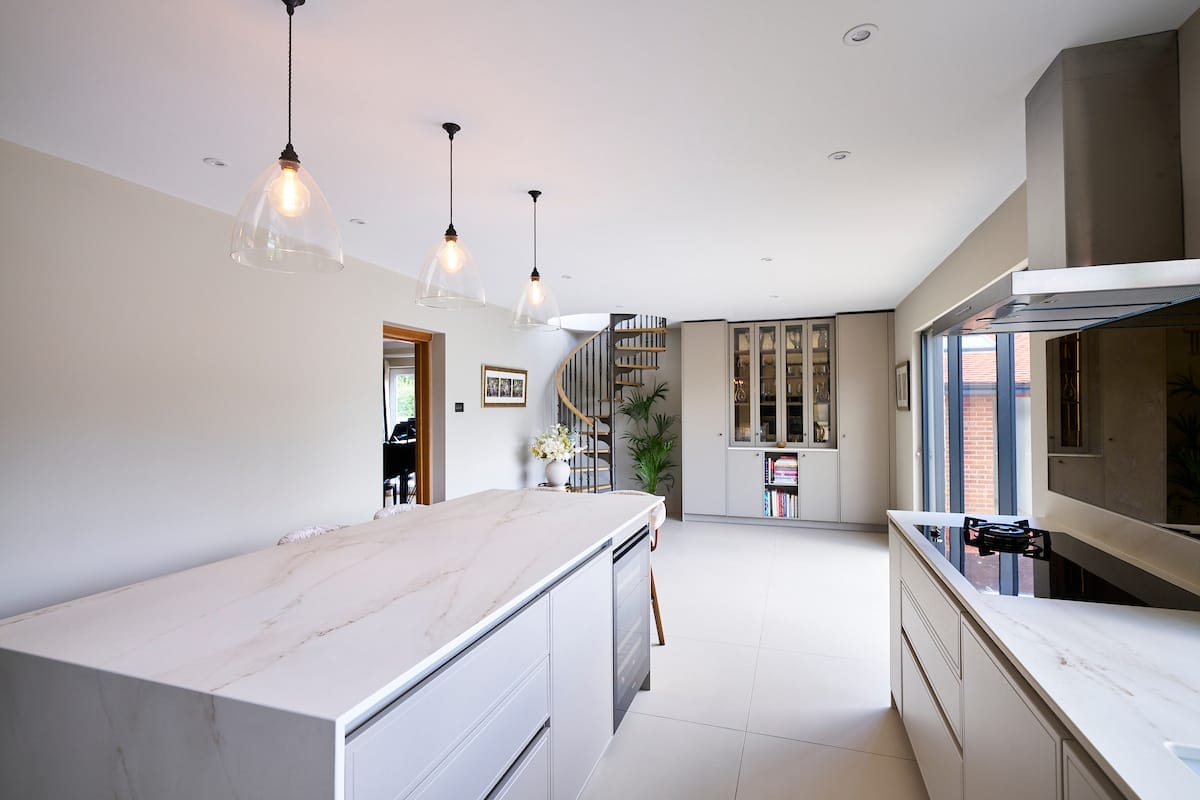 Overview of open plan living space with kitchen island for breakfast and entertaining
